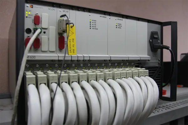 Rack-mounted test equipment with harness connectors